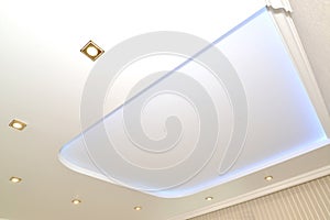 Trapezoid design and dot lamps on an opaque stretch ceiling