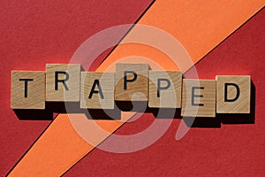 Trapped, word as banner headline