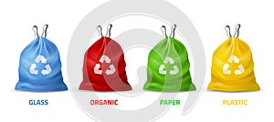 Trash bags colors. Realistic packages with handles for separate garbage collection, different colors and recycling sign