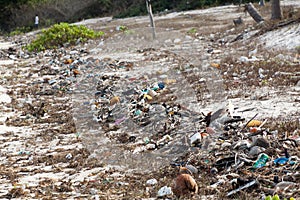 Trash in a beautiful beach landscape