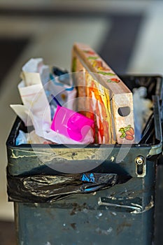 Trash bin full of garbage