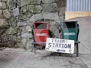 Trash Bins & Train Sign photo