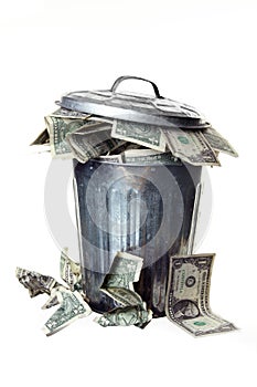 Trash can full of money photo