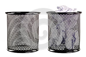 Trash can full of paper