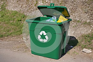 Trash can for waste with recycle symbol