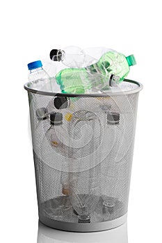 Trash can with wasted plastic bottles, isolated on white