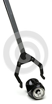 Trash grabber picking up a can