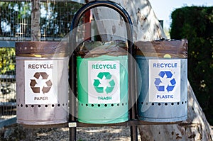 Trash recycle bin for different materials in a park