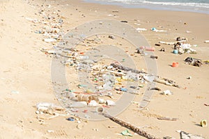 Trash on tropical Beach. Plastic pollution environmental problem
