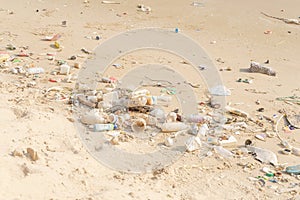 Trash on tropical Beach. Plastic pollution environmental problem