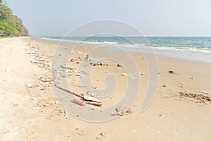 Trash on tropical Beach. Plastic pollution environmental problem