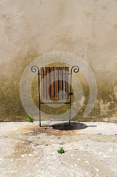 Trashcan and sprouting plants in a dreary environment