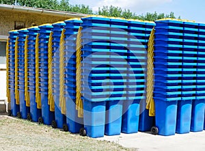 Trashcans in a row outdoors