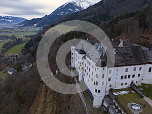 Tratzberg Castle in Tyrol, Austria. Aerial Drone View at winter twilights. White Renaissance Castle with Panorama View