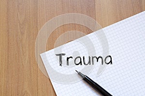 Trauma write on notebook