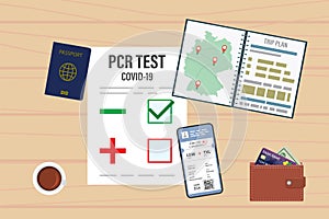 Travel accessories, route planning. Items on table, top view. Negative PCR test for coronavirus. New rules for tourists