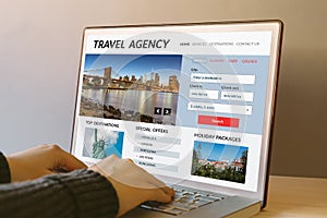 Travel agency concept on laptop computer screen photo