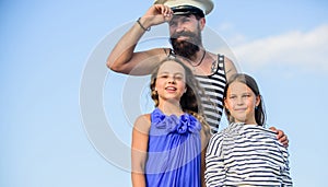 Travel around world. Travel by sea. Summer travel concept. Happy family. Dad sailor and daughters outdoors. Captain