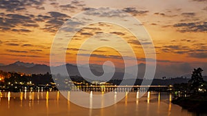 Travel asia. Panoramic view of Golden morning light. Mon Bridge is the long wooden bridge. Official name is Attanusorn Bridge. Is