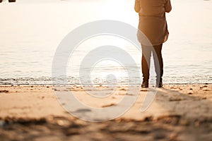 Travel background beautiful young women stand alone beach with s