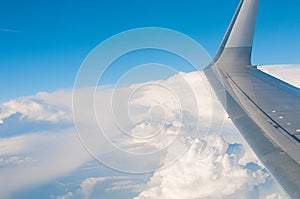 Travel background image of wing in the sky