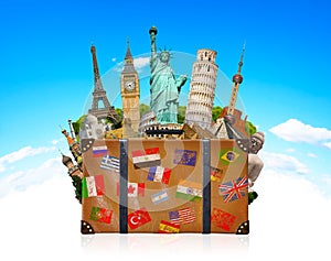 Travel bag full of famous monument of the world