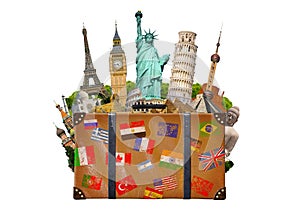 Travel bag full of famous monument of the world on white backgr