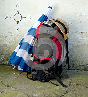 Travel Bag with Sign of Compass on Wall
