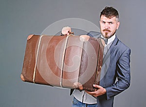 Travel and baggage concept. Hipster traveler with baggage. Baggage insurance. Man well groomed bearded hipster with big