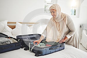 Travel, bedroom and Muslim woman with suitcase packing for holiday, vacation and religious trip. Home, luggage and