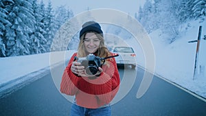 Travel blogger influencer girl makes photos winter