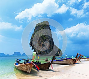 Travel boat on Thailand island beach. Tropical coast Asia landscape background