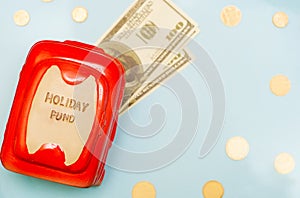 Travel budget - vacation money savings in money box. photo