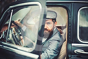 Travel and business trip or hitch hiking. Couple in love on romantic date. Bearded man and sexy woman in car. Retro