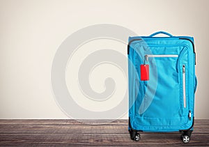 Big travel suitcase on background