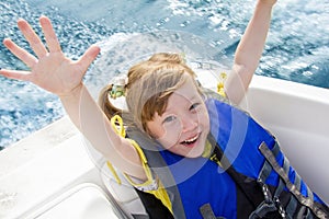 Travel of children on water in the boat