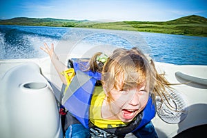 Travel of children on water in the boat