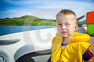 Travel of children on water in the boat