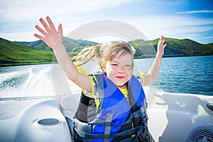 Travel of children on water in the boat