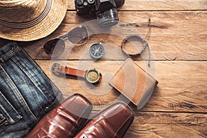 Travel Clothing accessories for men on wooden floor