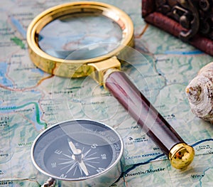 Travel concept with compass and map