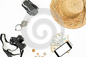 Travel concept with frame. Drone, straw hat, camera, compass and usa money on white background. Flat lay, top view.