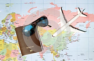 Travel concept with plan money passport  sunglasses