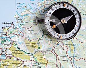Travel concept. Tourist map of Norway and compass