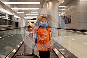 Travel. Coronavirus protection. Child face in a mask.