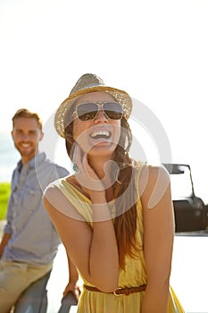 Travel couple, road trip car park and happy woman on holiday adventure, transportation journey or fun summer vacation