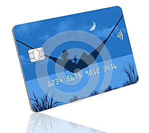 A travel credit card is decorated with a vactioning woman in a hammock on the beach