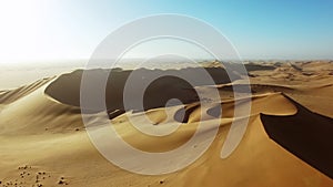 Travel, desert and freedom with drone of sand dunes for destination, sunset and summer journey. Namibia, adventure and