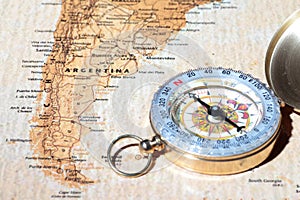 Travel destination Argentina, ancient map with vintage compass