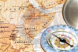 Travel destination Kenya, Ethiopia and Somalia, ancient map with vintage compass